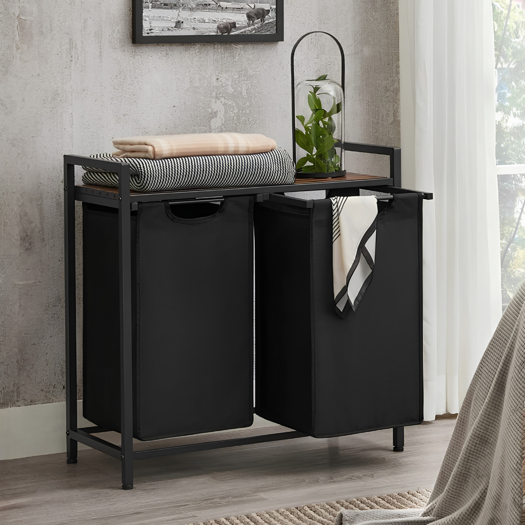 Laundry basket with black material and a dark brown wood surface. Black metal Frame